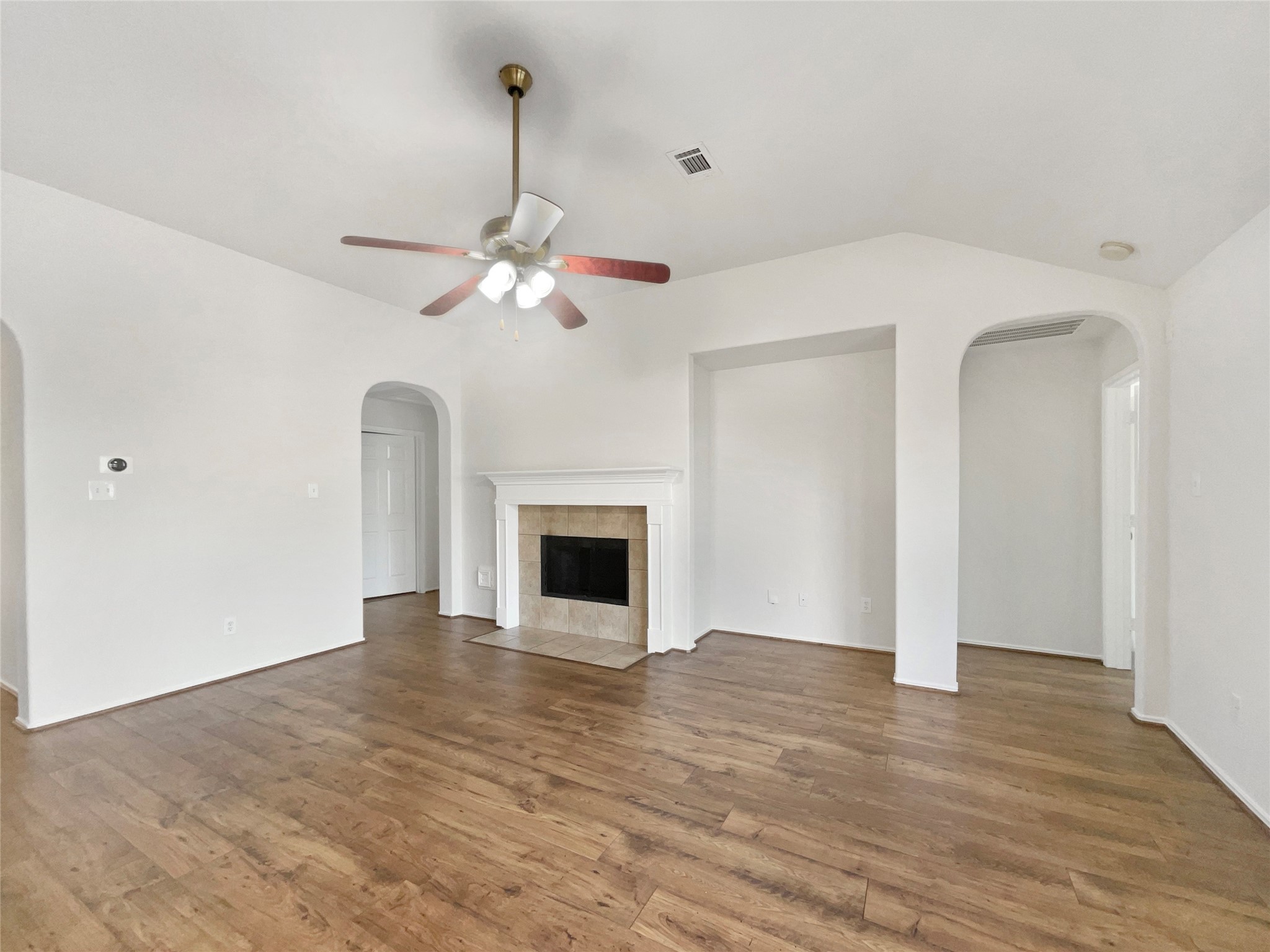18810 Appletree Ridge Road Houston, TX 77084 - Photo 16 of 24 a view of an empty room with a fireplace