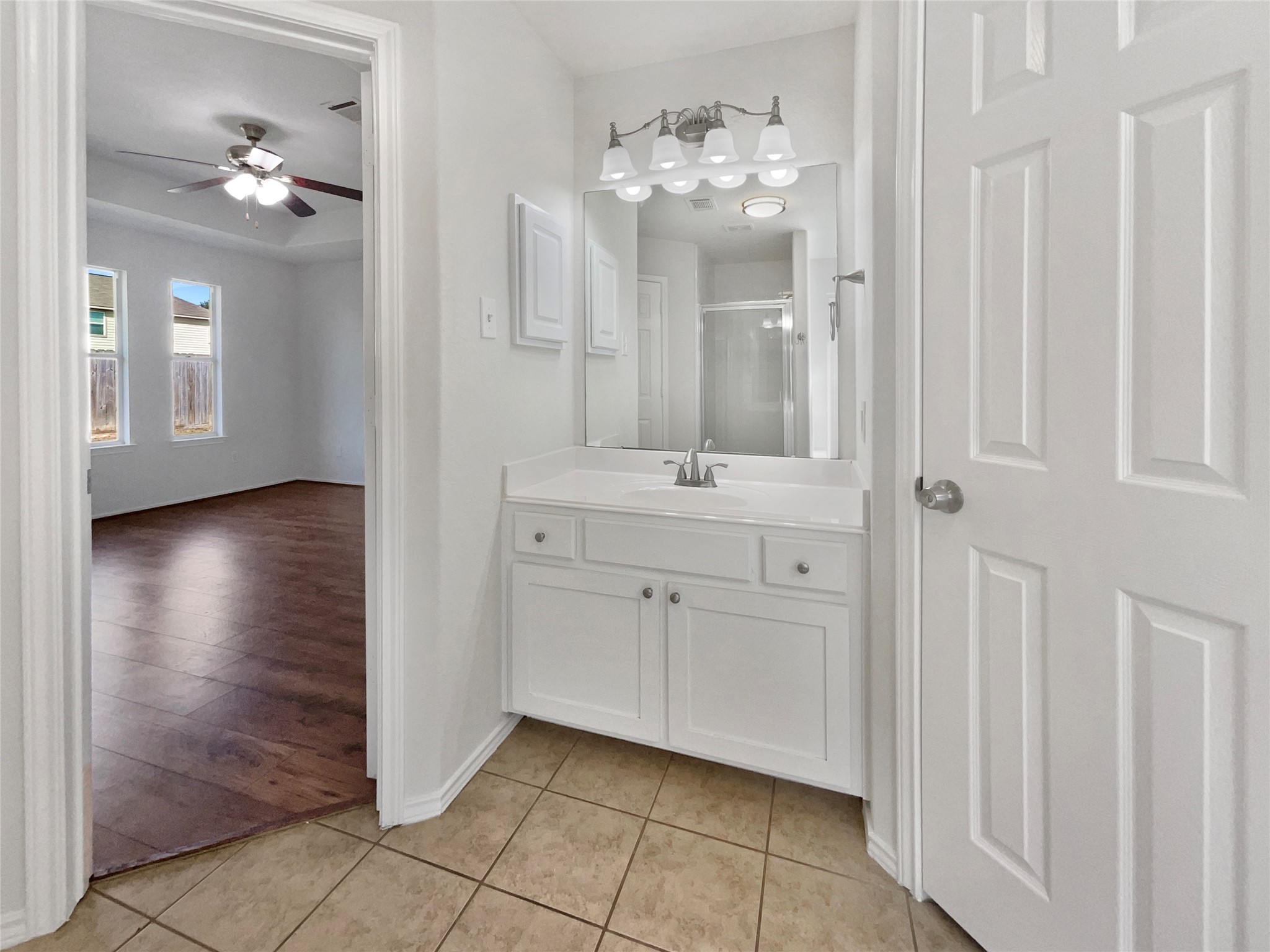 18810 Appletree Ridge Road Houston, TX 77084 - Photo 19 of 24 a spacious en suite bathroom with a mirror and shower