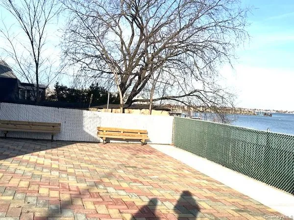 a view of a lake with a city