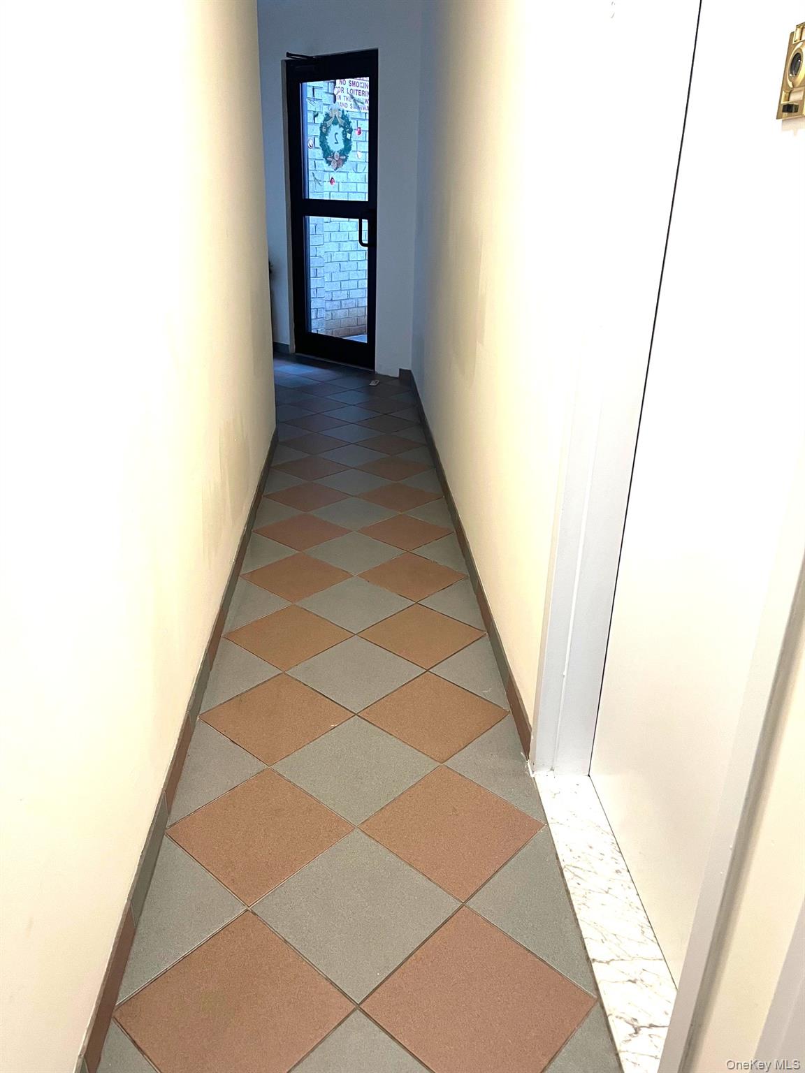 520 Ellsworth Avenue, Unit 2B Bronx, NY 10465 - Photo 19 of 21 Corridor featuring baseboards