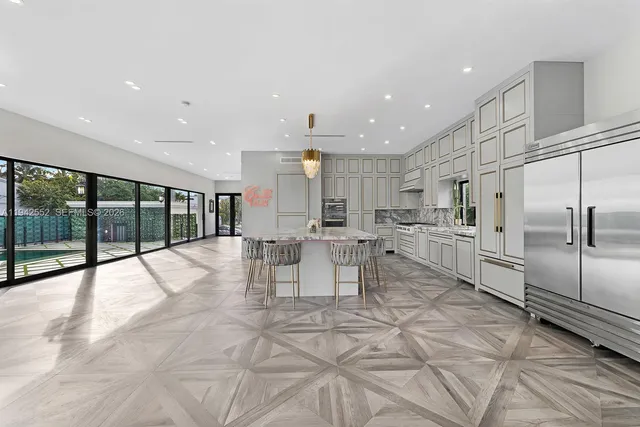 a bathroom with a sink and mirror