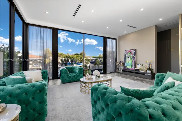 a lobby with furniture and window