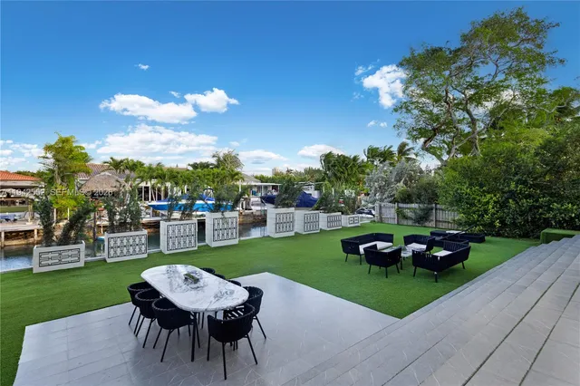 a view of a chairs and table on the terrace