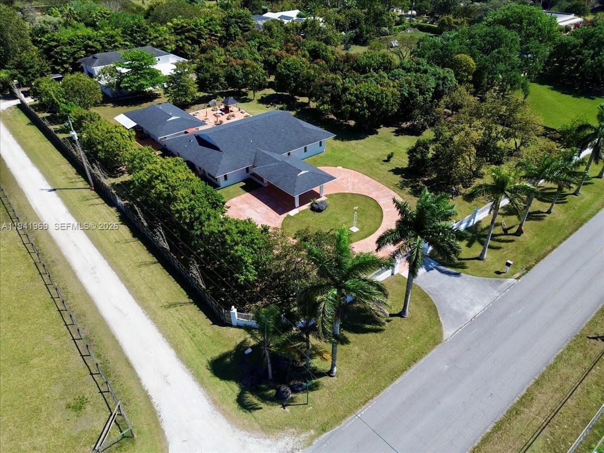 24555 Southwest 167th Avenue, Unit 1 Homestead, FL 33031 - Photo 28 of 33 an aerial view of a house with a garden