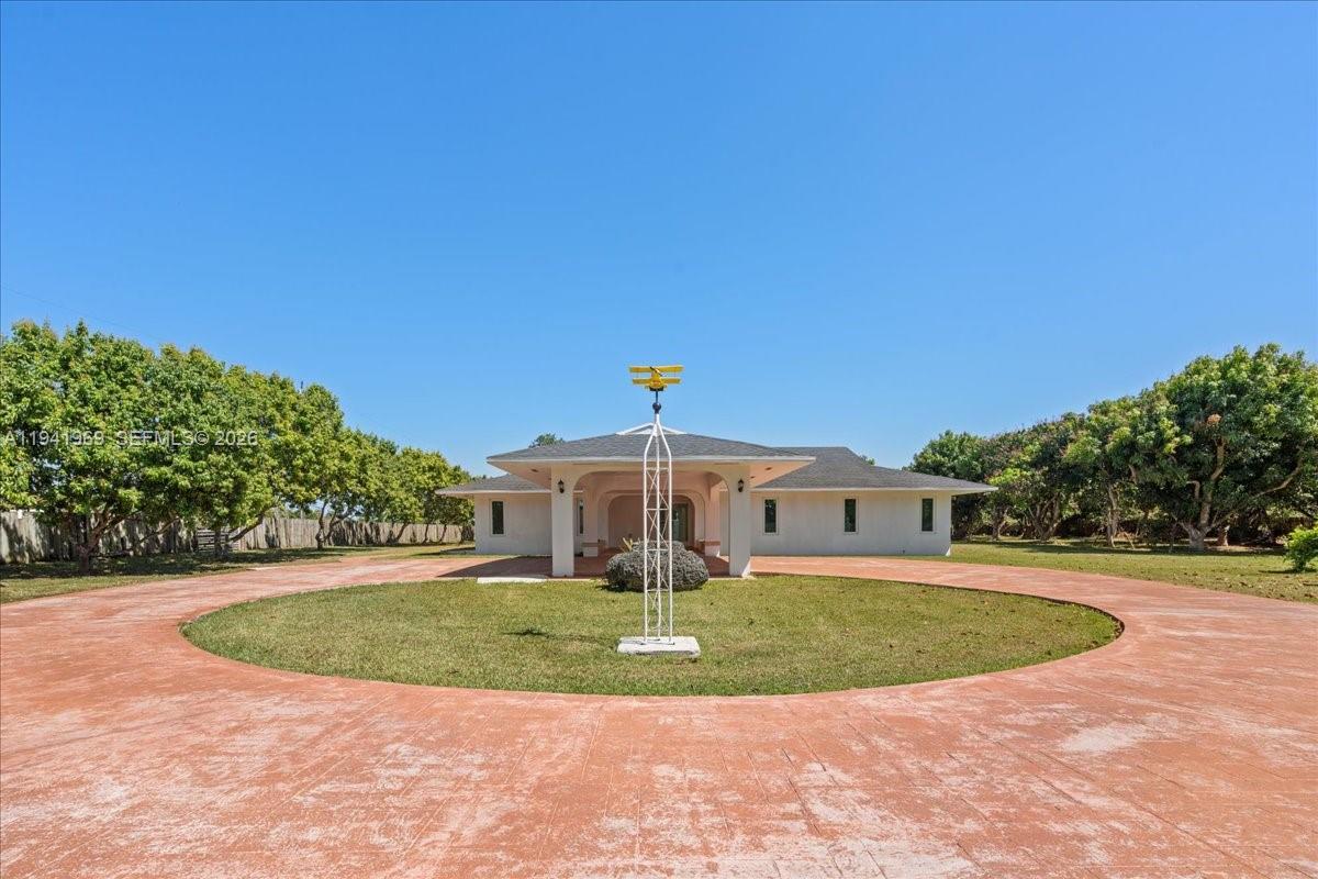 24555 Southwest 167th Avenue, Unit 1 Homestead, FL 33031 - Photo 8 of 33 a view of a basketball court