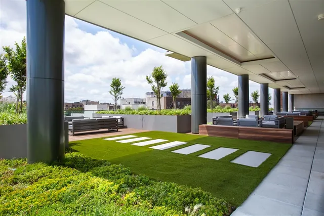 a view of swimming pool with a patio
