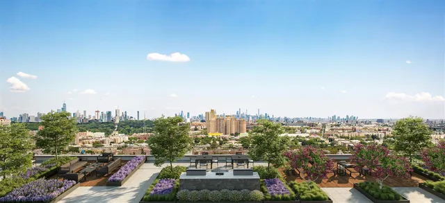 a bathroom with a tub and a shower