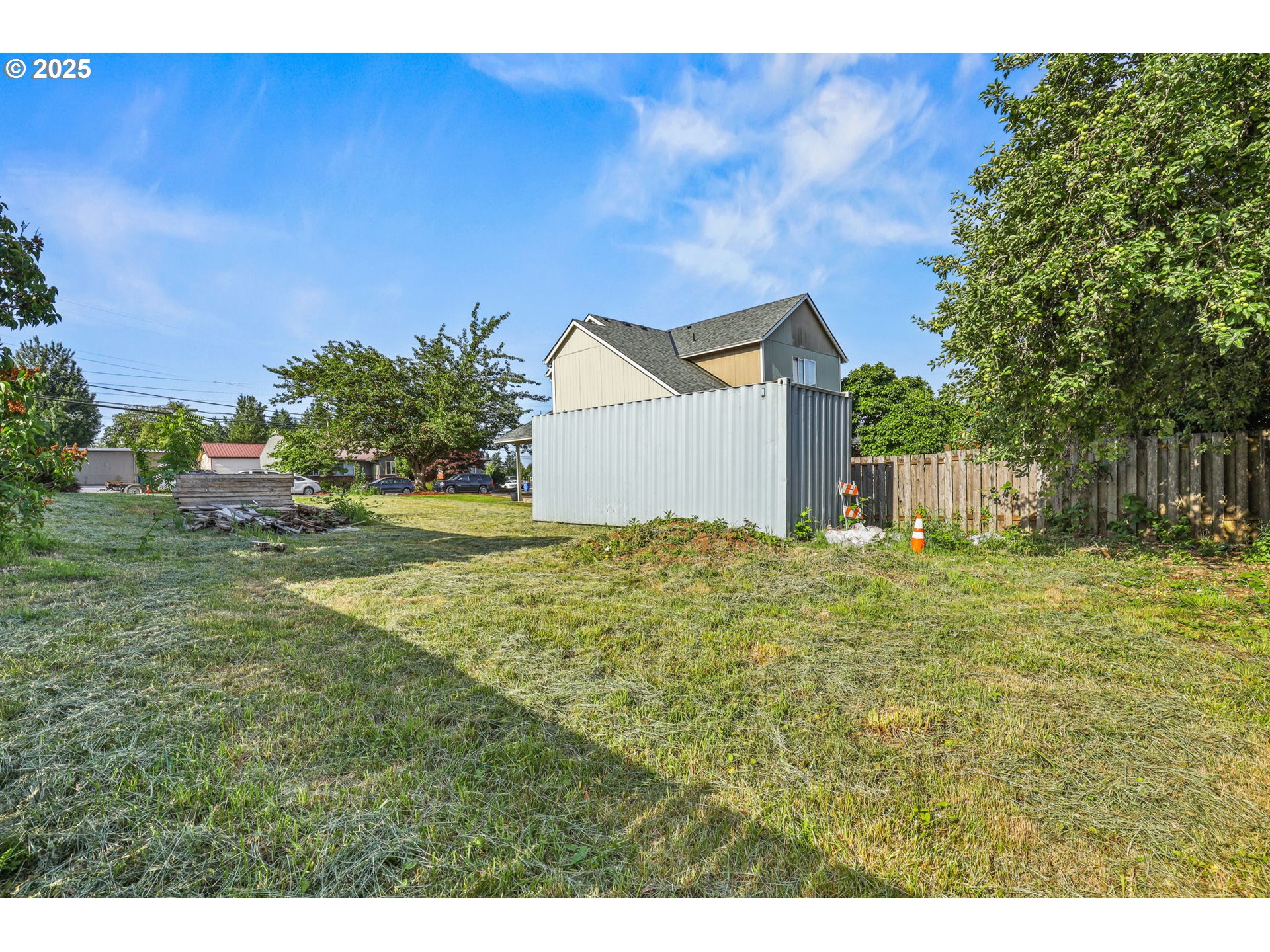 38565 Pleasant Street Sandy, OR 97055 - Photo 9 of 13 a backyard of a house with lots of green space