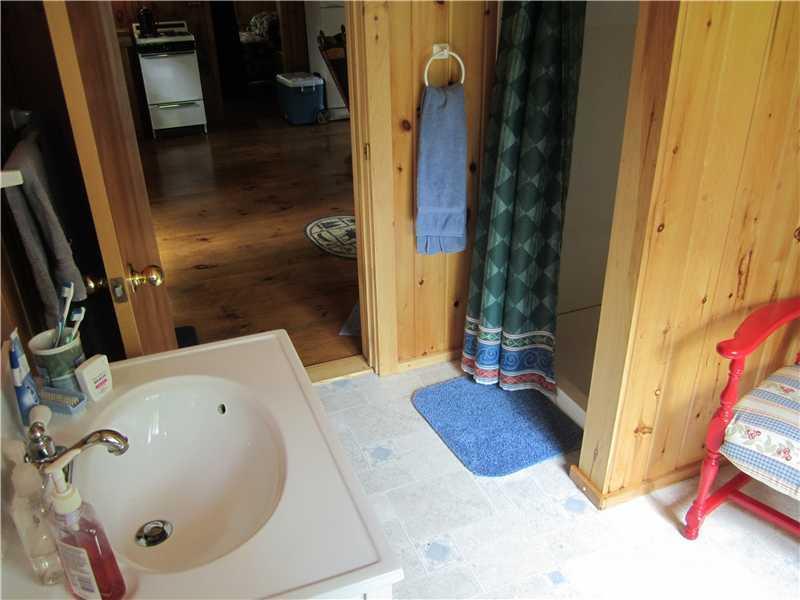 496 Grace Pond Road West Forks, ME 04985 - Photo 8 of 16 Bathroom. Drilled well furnishes a...