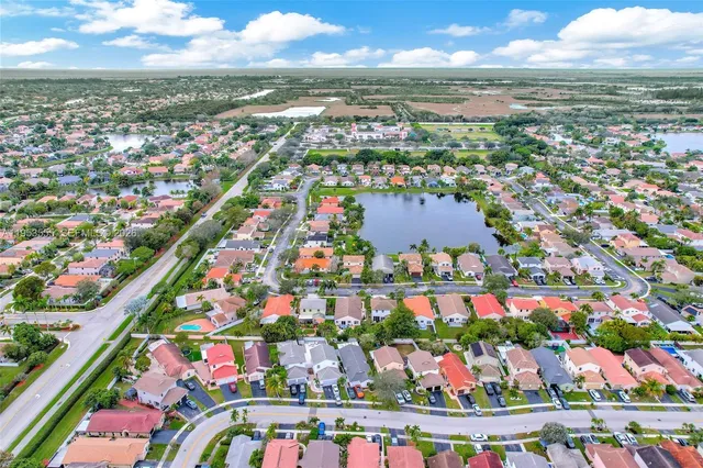 a living room with furniture fireplace and flat screen tv