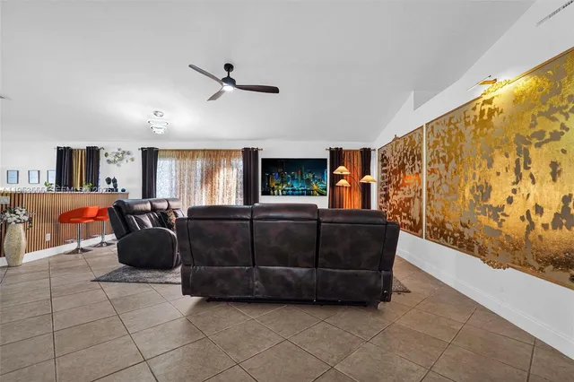 a kitchen with stainless steel appliances a refrigerator sink and microwave