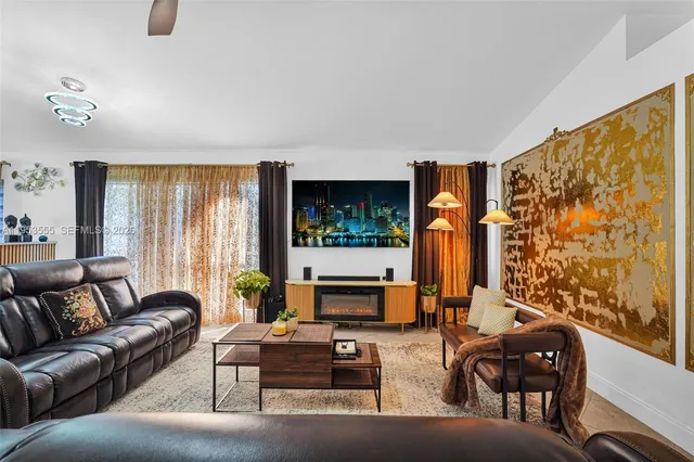 a kitchen with stainless steel appliances granite countertop a stove sink and cabinets