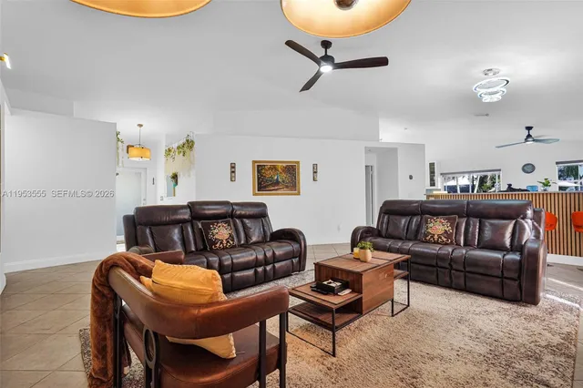 a kitchen with stainless steel appliances a sink stove and refrigerator