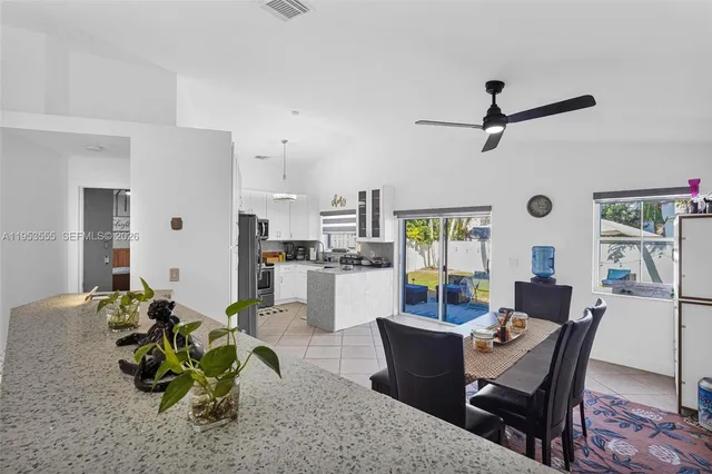 a bed room with a bed and window