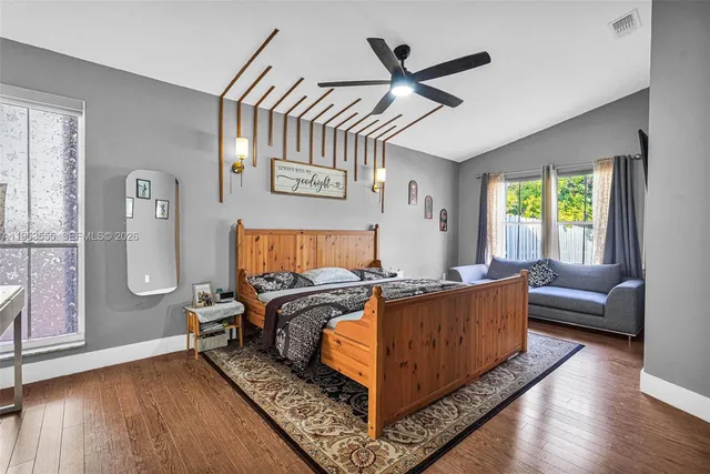 a view of a patio with couches table and chairs