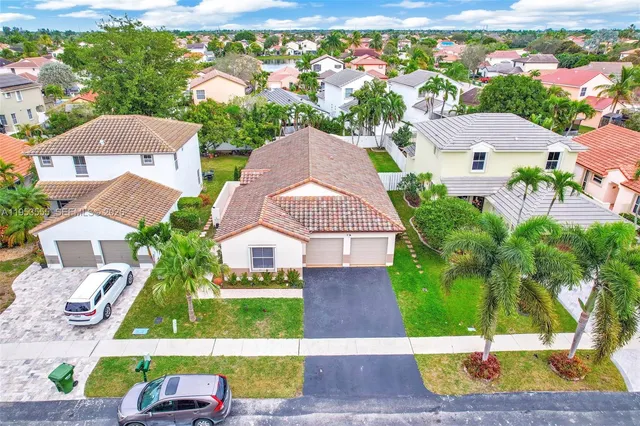 a view of swimming pool with a patio