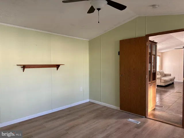 a view of a livingroom with wooden floor