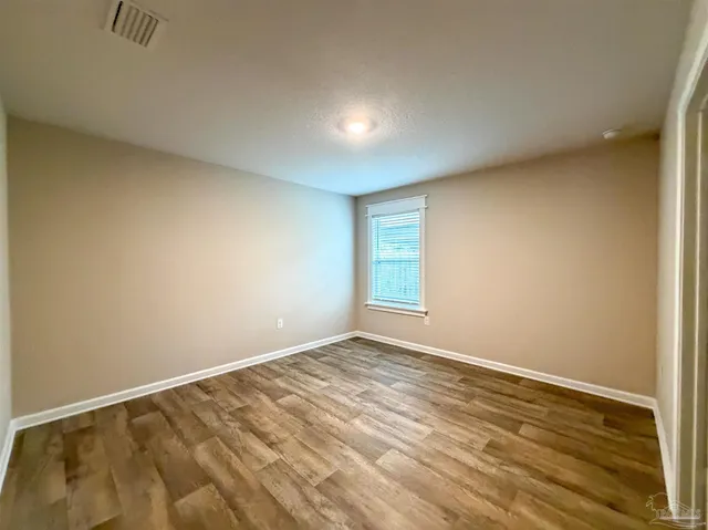 wooden floor in a room