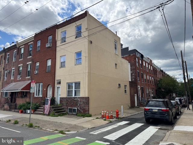 1232 South 11th Street Philadelphia, PA 19147 - Photo 1 of 16 a car parked in front of a building