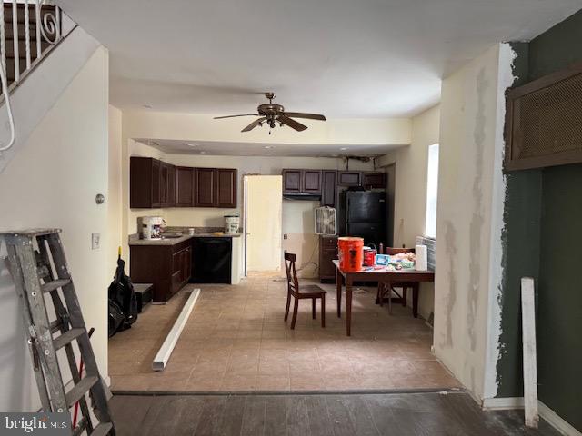 1232 South 11th Street Philadelphia, PA 19147 - Photo 4 of 16 a view of kitchen with sink microwave and cabinets