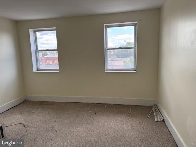 1232 South 11th Street Philadelphia, PA 19147 - Photo 6 of 16 an empty room with a window