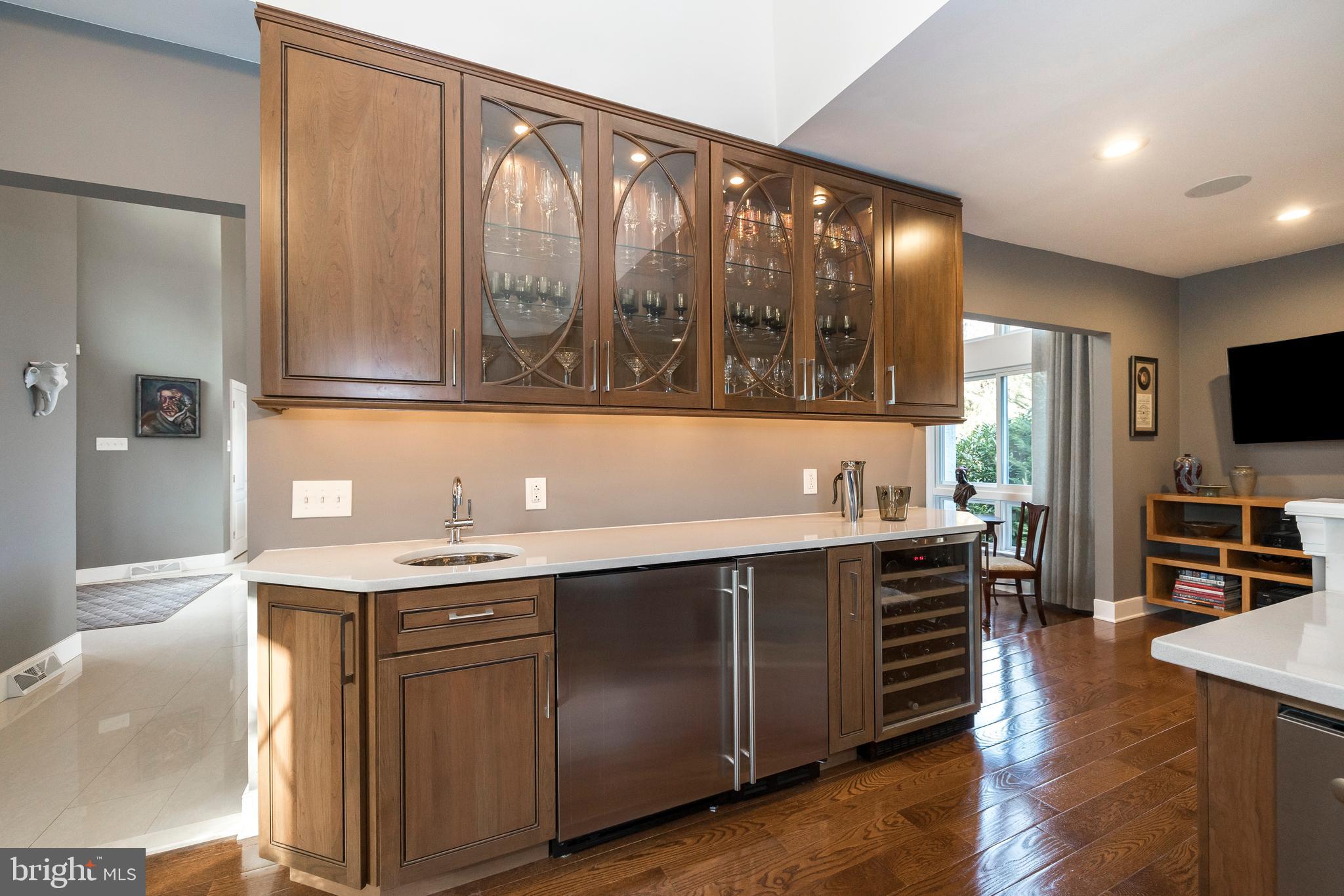 398 Lakeside Road Ardmore, PA 19003 - Photo 14 of 51 Entertainment area with wine cooler, fridge, more