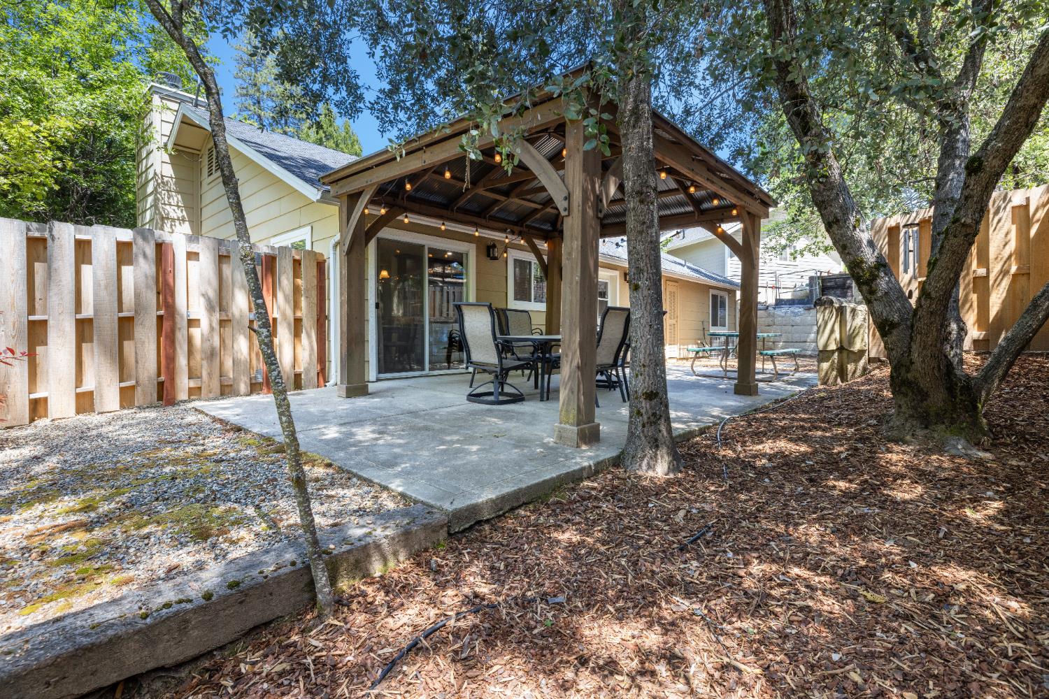 39398 Robin Bass Lake, CA 93604 - Photo 24 of 31 a view of a house with a tree on the road