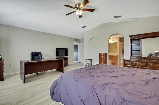 a bathroom with a sink a mirror and a bathtub