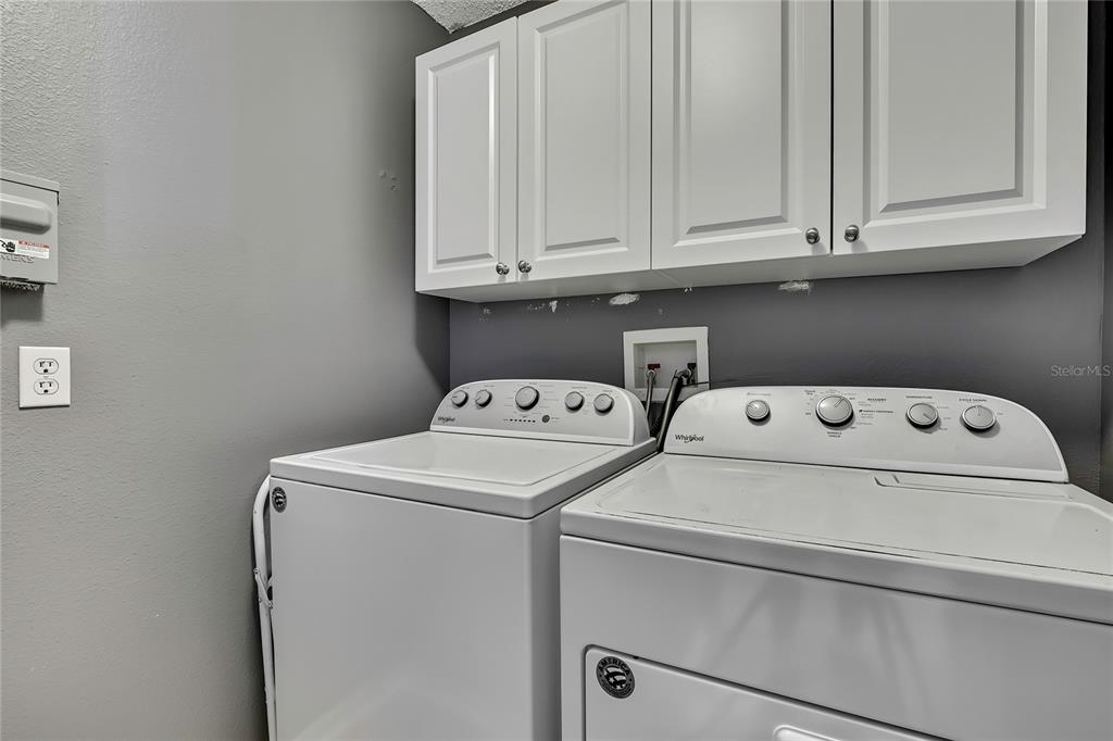 11257 Persimmon Avenue Weeki Wachee, FL 34614 - Photo 30 of 50 a utility room with dryer and washer