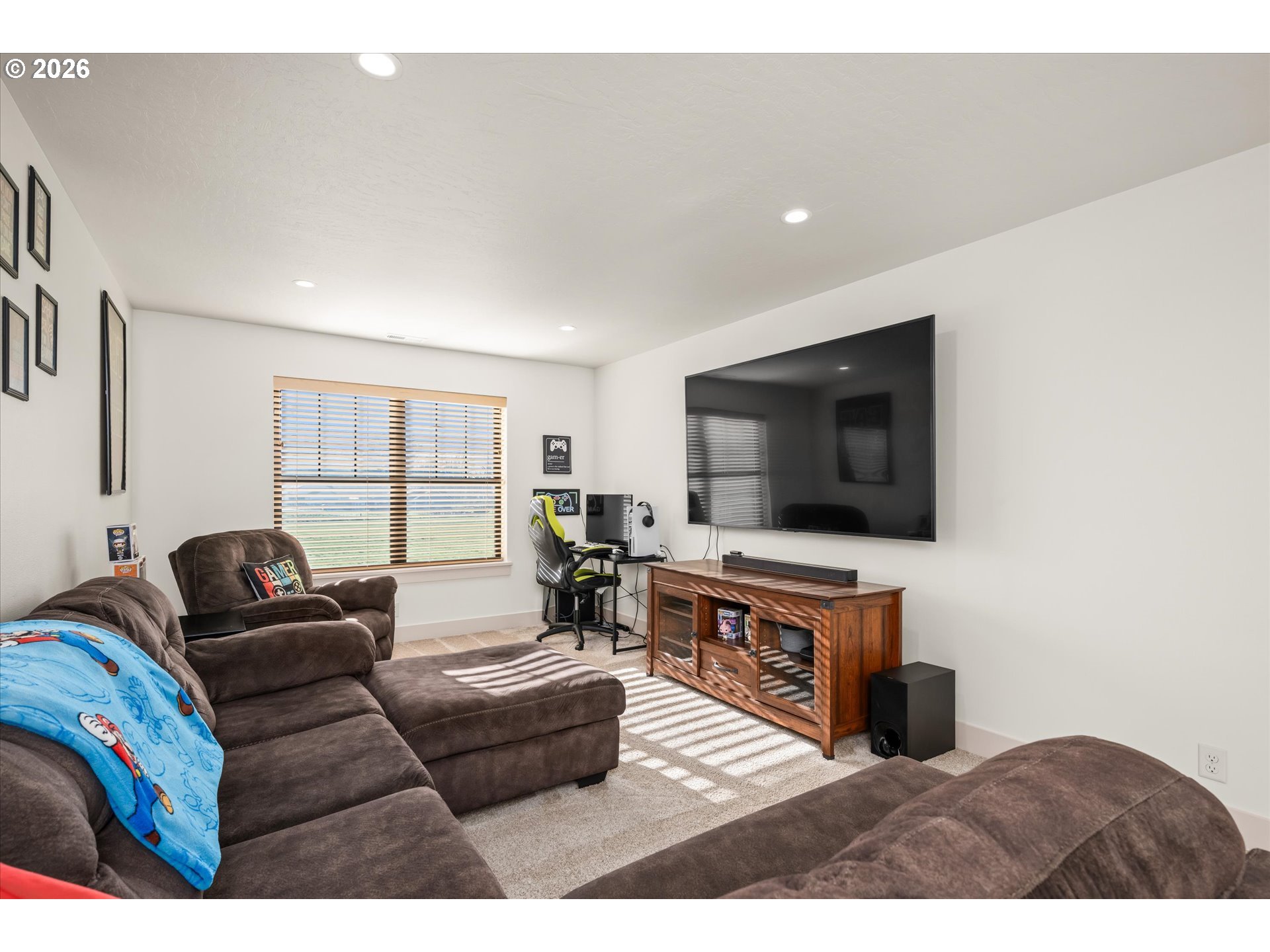 37640 Upper Camp Creek Road Springfield, OR 97478 - Photo 32 of 47 a living room with furniture and a flat screen tv