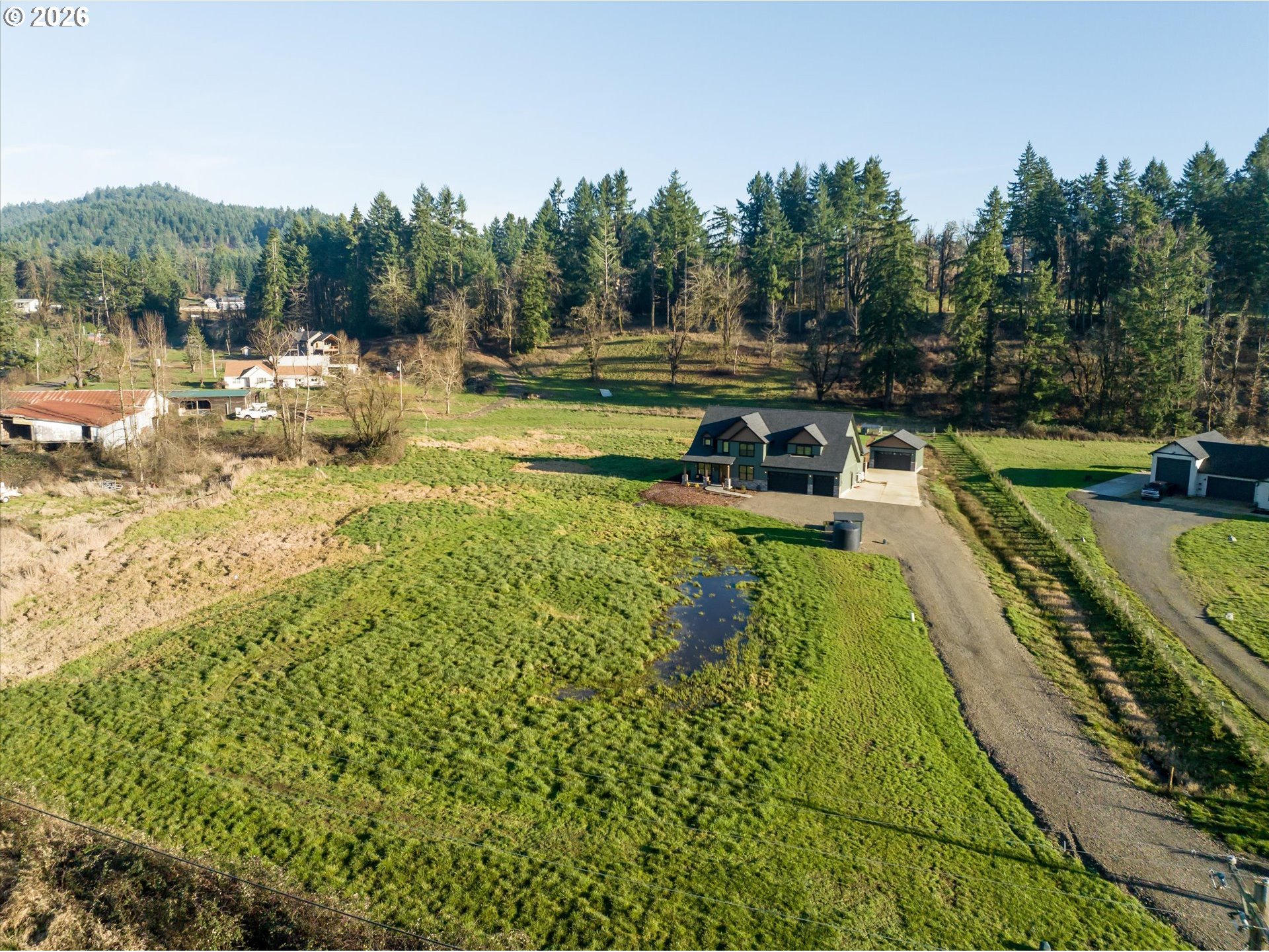 37640 Upper Camp Creek Road Springfield, OR 97478 - Photo 42 of 47 a view of a swimming pool with a yard and mountain view