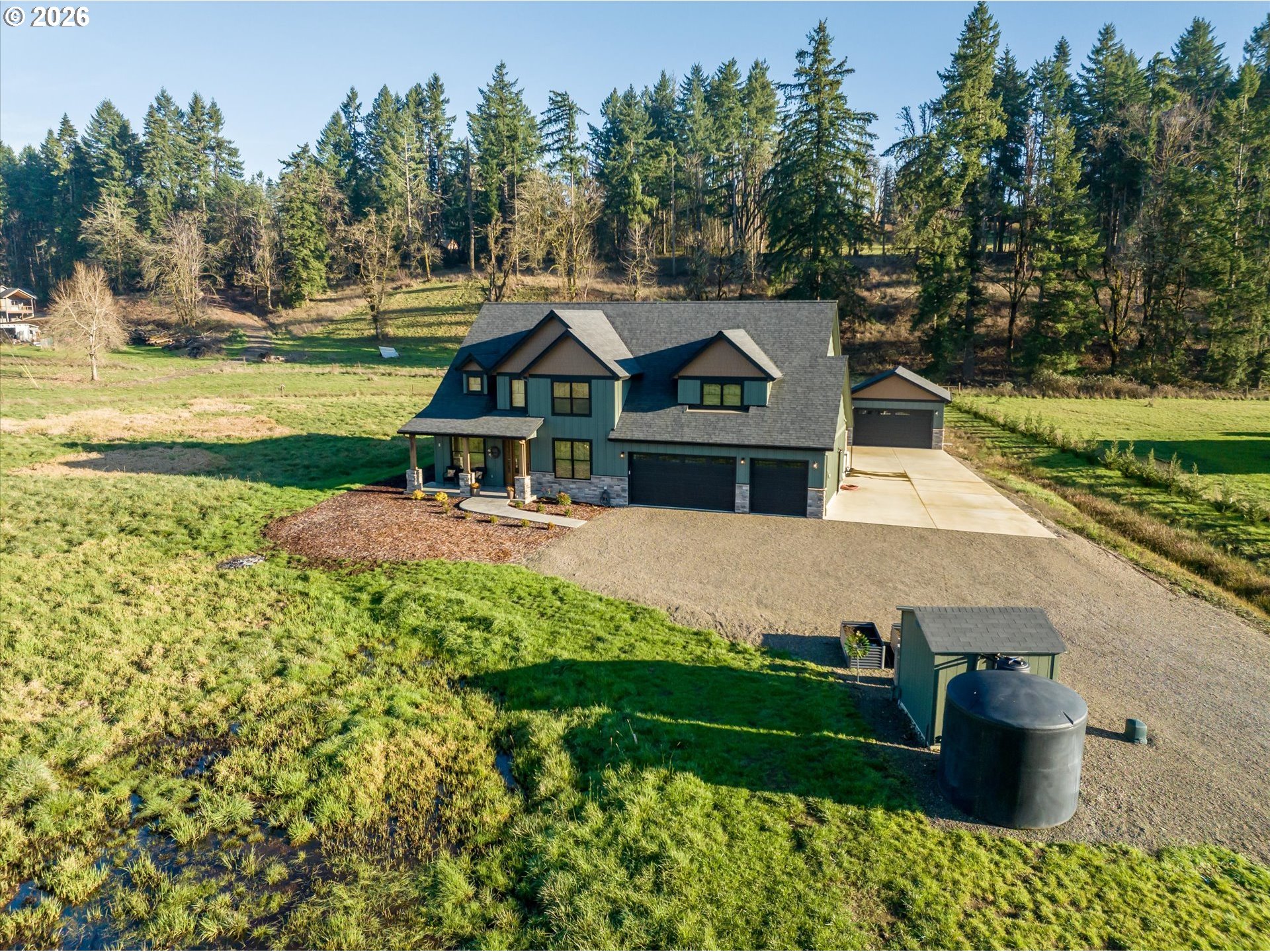 37640 Upper Camp Creek Road Springfield, OR 97478 - Photo 43 of 47 an aerial view of a house with a yard basket ball court and outdoor seating