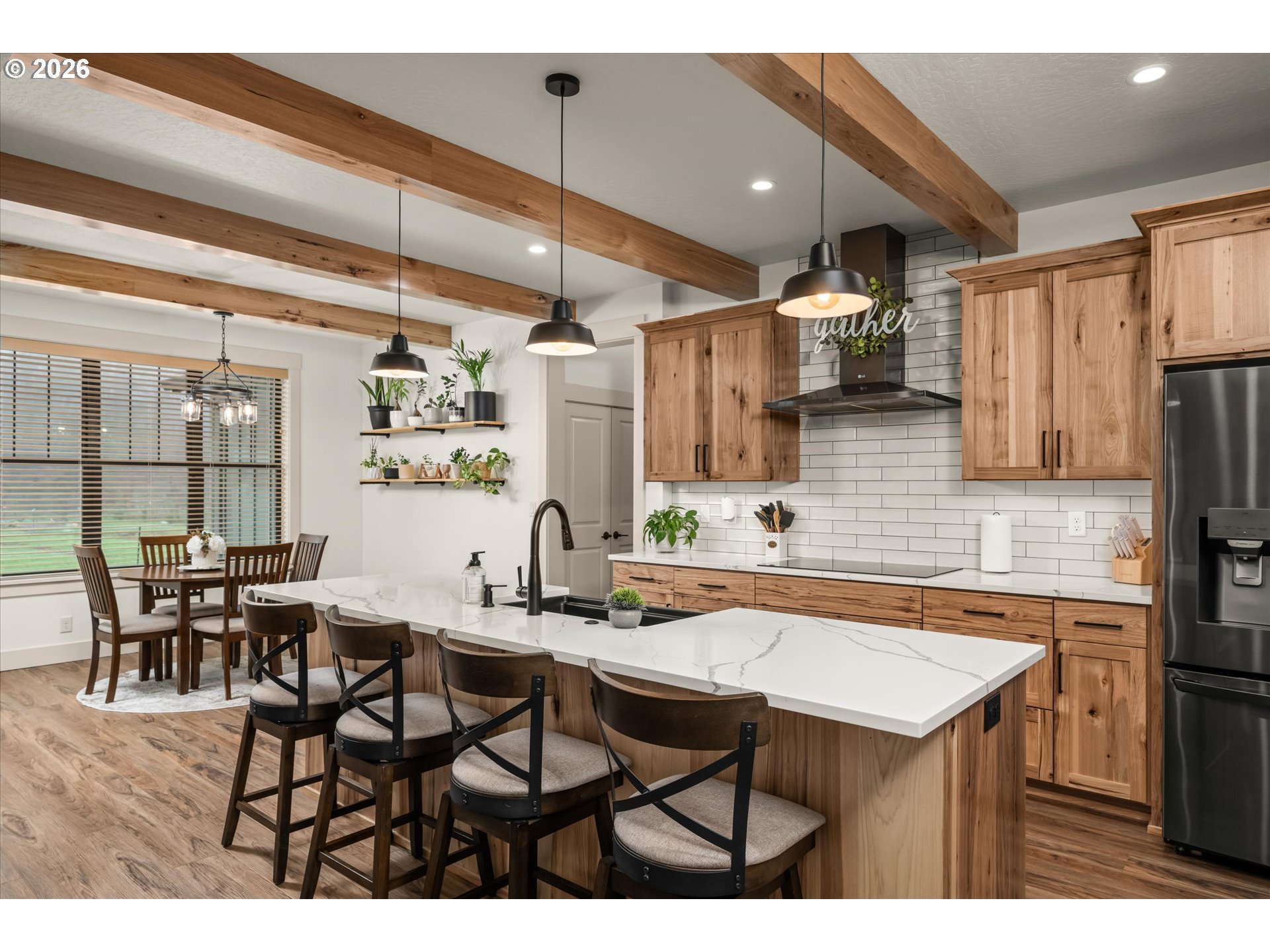 37640 Upper Camp Creek Road Springfield, OR 97478 - Photo 9 of 47 a kitchen with a table chairs stove and refrigerator