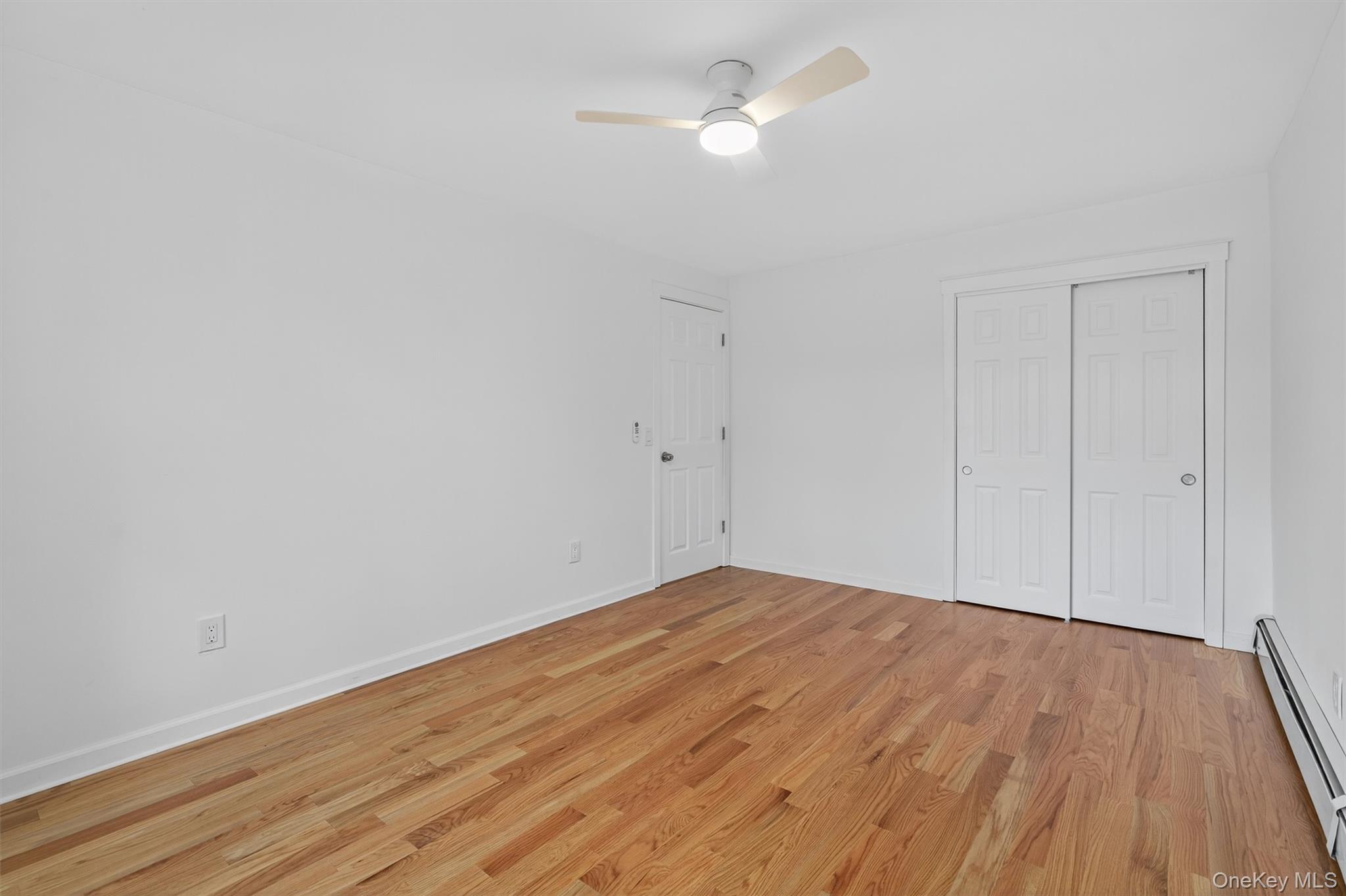 85 Holloran Road New Windsor, NY 12553 - Photo 9 of 22 a view of empty room with wooden floor