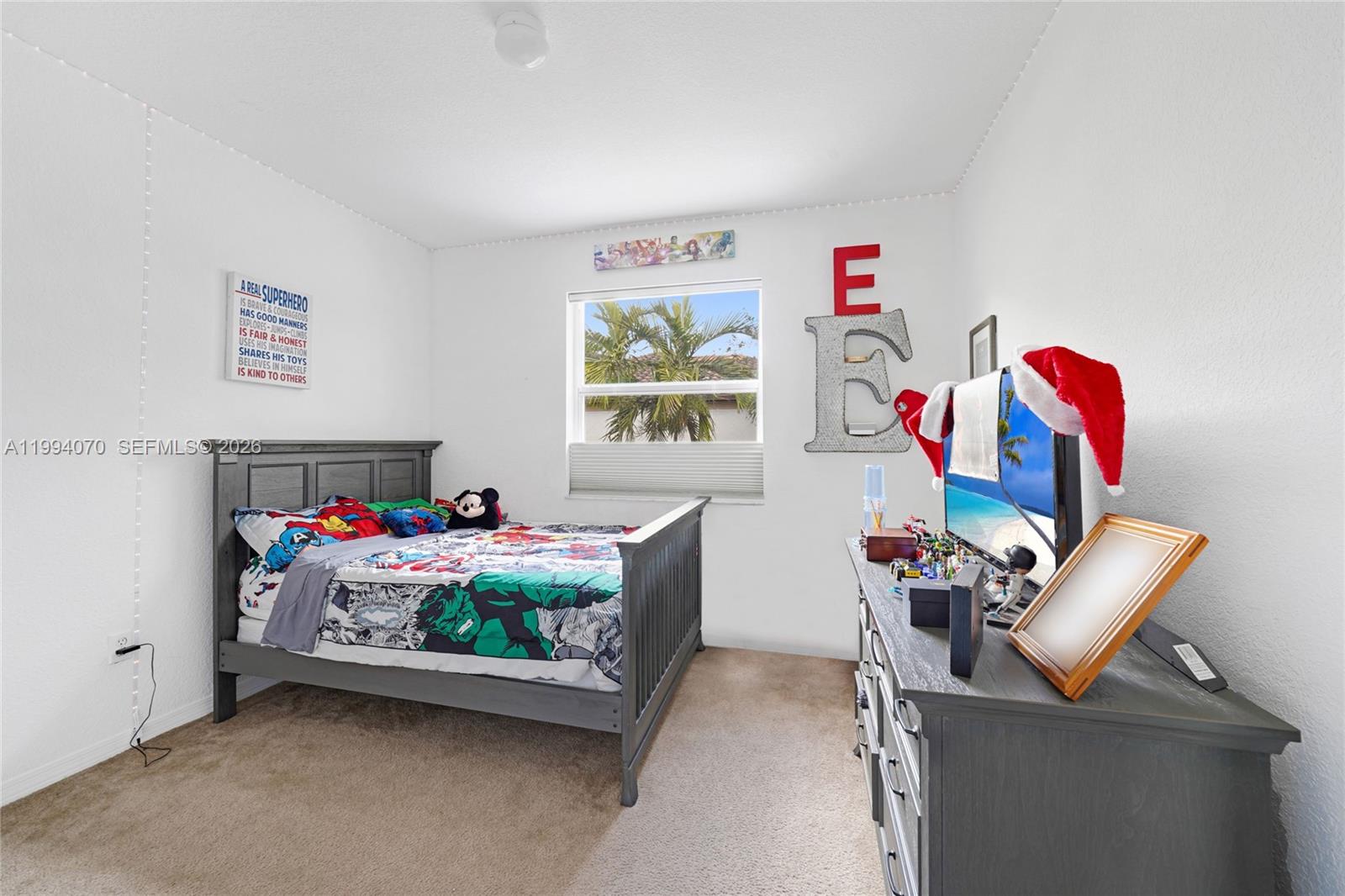12763 Southwest 50th Street Miramar, FL 33027 - Photo 25 of 38 a view of a workspace with furniture and toys
