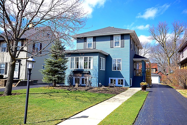 260 Addison Road Riverside, IL 60546 - Photo 1 of 25 a front view of a house with a yard