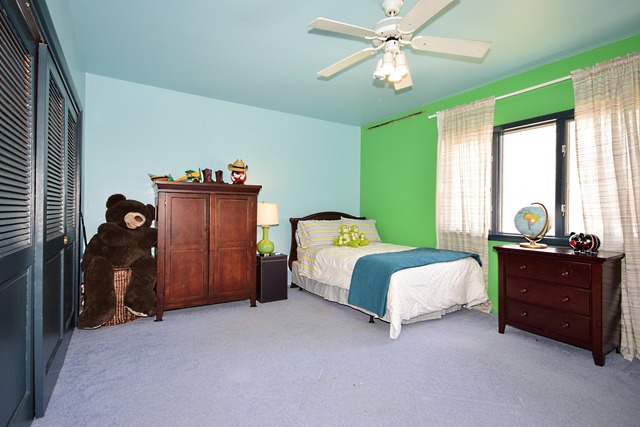 260 Addison Road Riverside, IL 60546 - Photo 13 of 25 a spacious bedroom with a bed and a chandelier