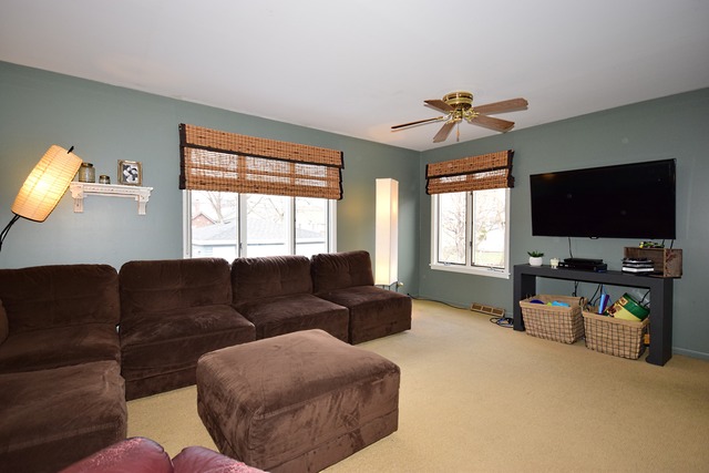 260 Addison Road Riverside, IL 60546 - Photo 17 of 25 a living room with furniture and a flat screen tv