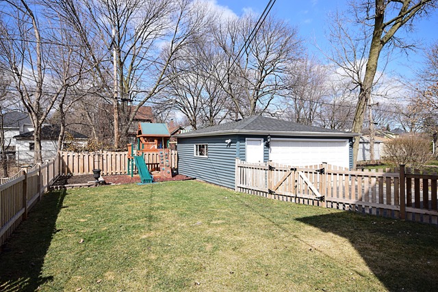 260 Addison Road Riverside, IL 60546 - Photo 24 of 25 a view of a house with a yard and fence