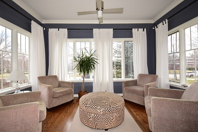 260 Addison Road Riverside, IL 60546 - Photo 5 of 25 a living room with furniture and a large window