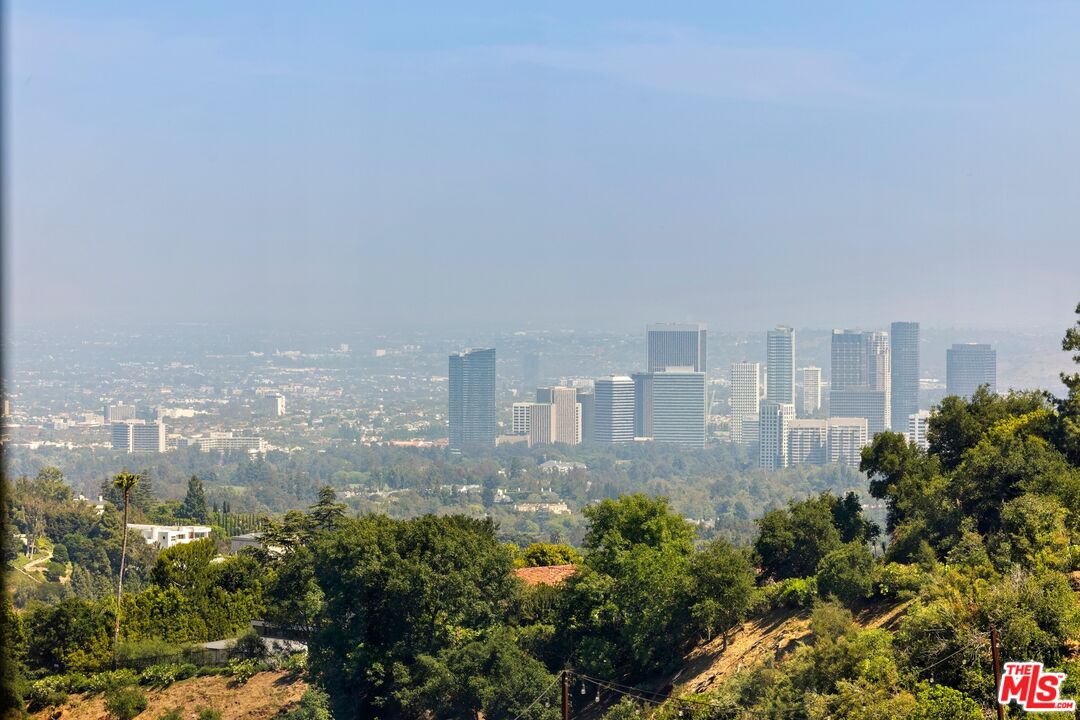 1244 Stradella Road Los Angeles, CA 90077 - Photo 26 of 31 a view of a city with tall buildings in the background