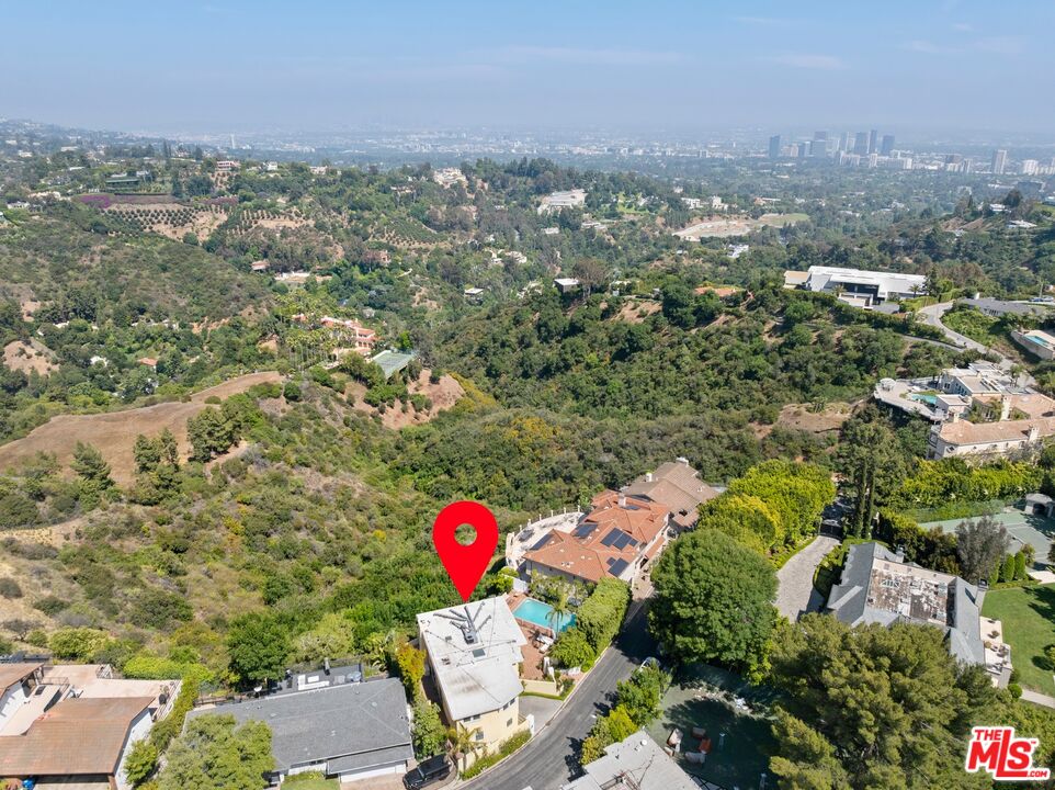 1244 Stradella Road Los Angeles, CA 90077 - Photo 29 of 31 view of city and mountain view