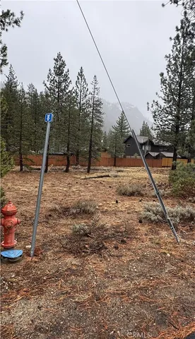 a backyard of a house with lots of swings