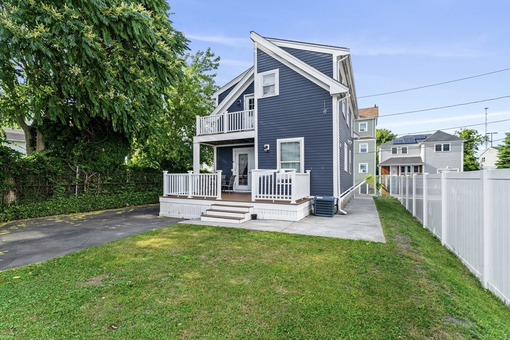 883 Grinnell Street Fall River, MA 02721 - Photo 31 of 41 a view of a house with a yard porch and sitting area