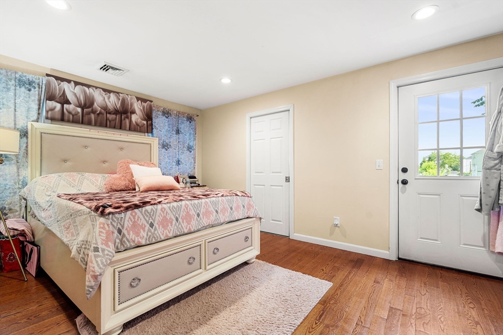 883 Grinnell Street Fall River, MA 02721 - Photo 5 of 41 a bedroom with a bed and window