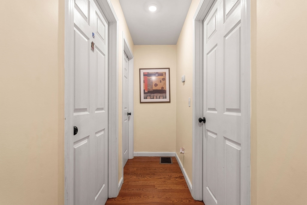 883 Grinnell Street Fall River, MA 02721 - Photo 10 of 41 a view of a hallway with wooden floor