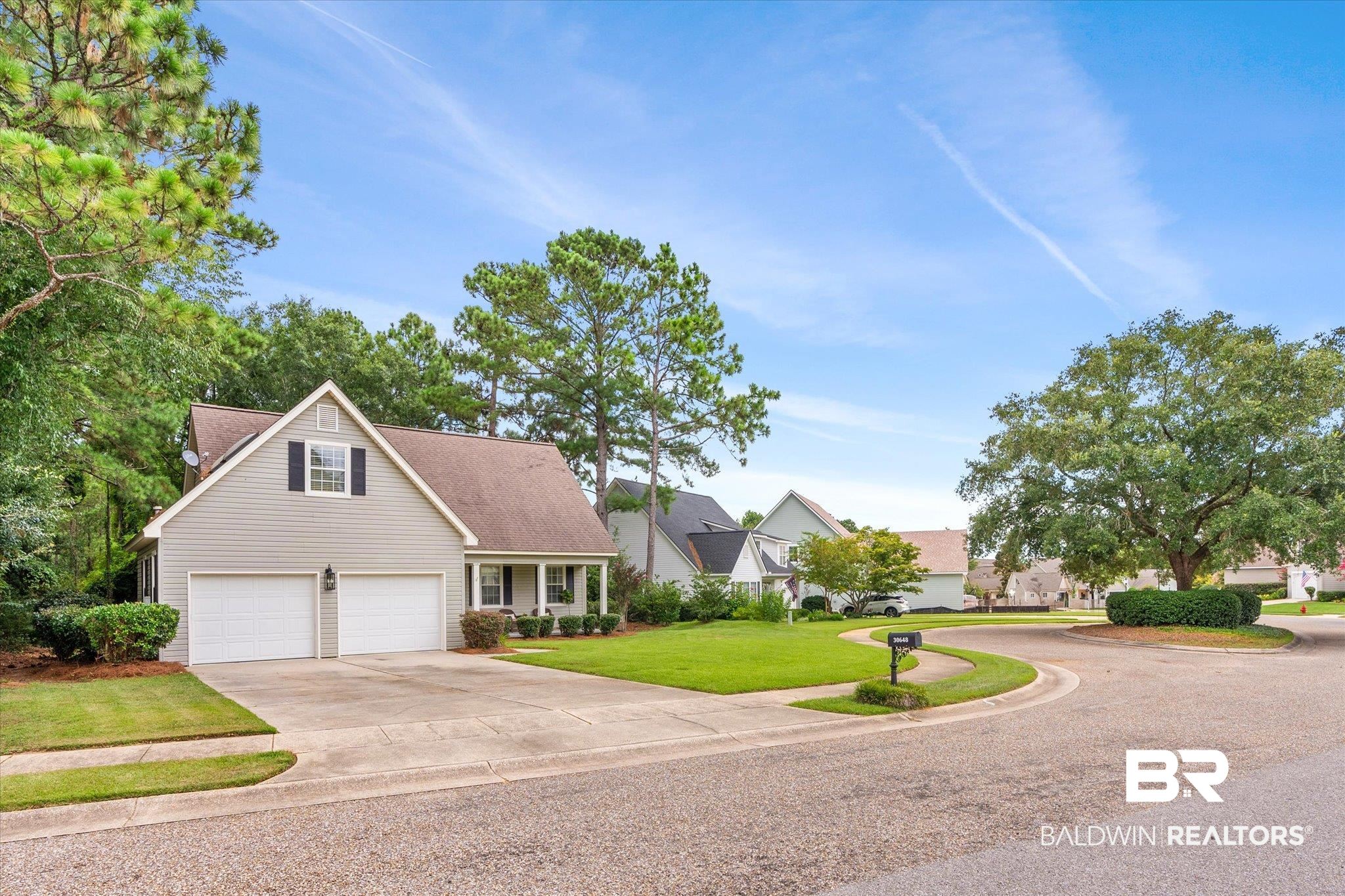 30648 Pine Court Daphne, AL 36527 - Photo 29 of 30 View of front facade with a garage and a front yard