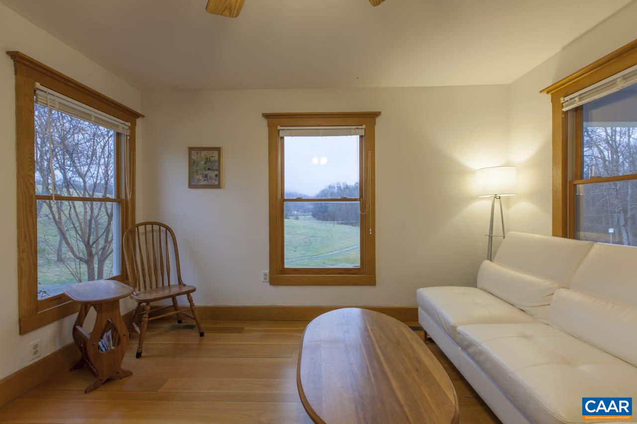 2317 Poor House Road Syria, VA 22743 - Photo 8 of 50 a living room with furniture and a window