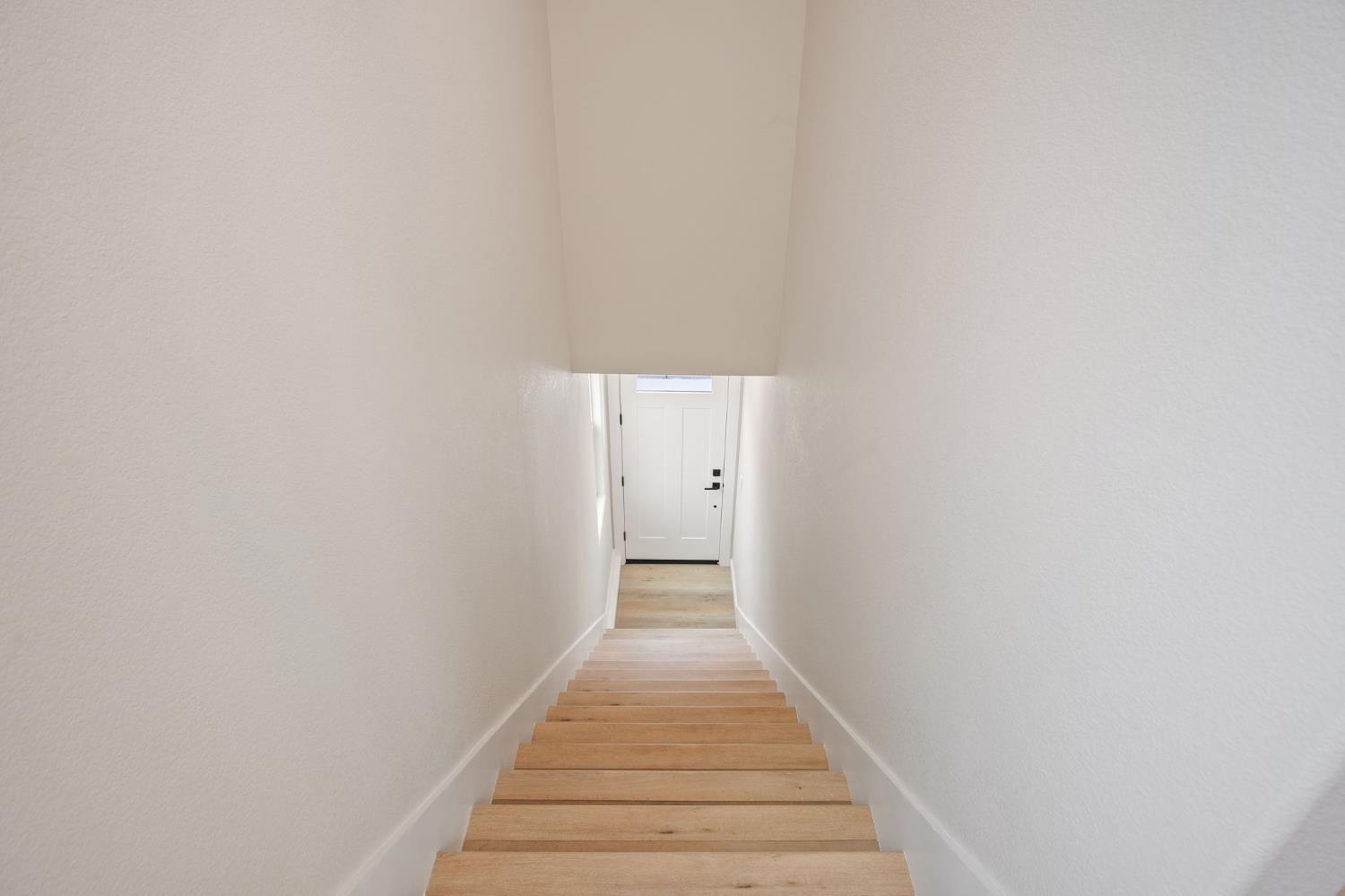 243 East 3rd Street Tracy, CA 95376 - Photo 18 of 29 a view of a hallway with wooden floor
