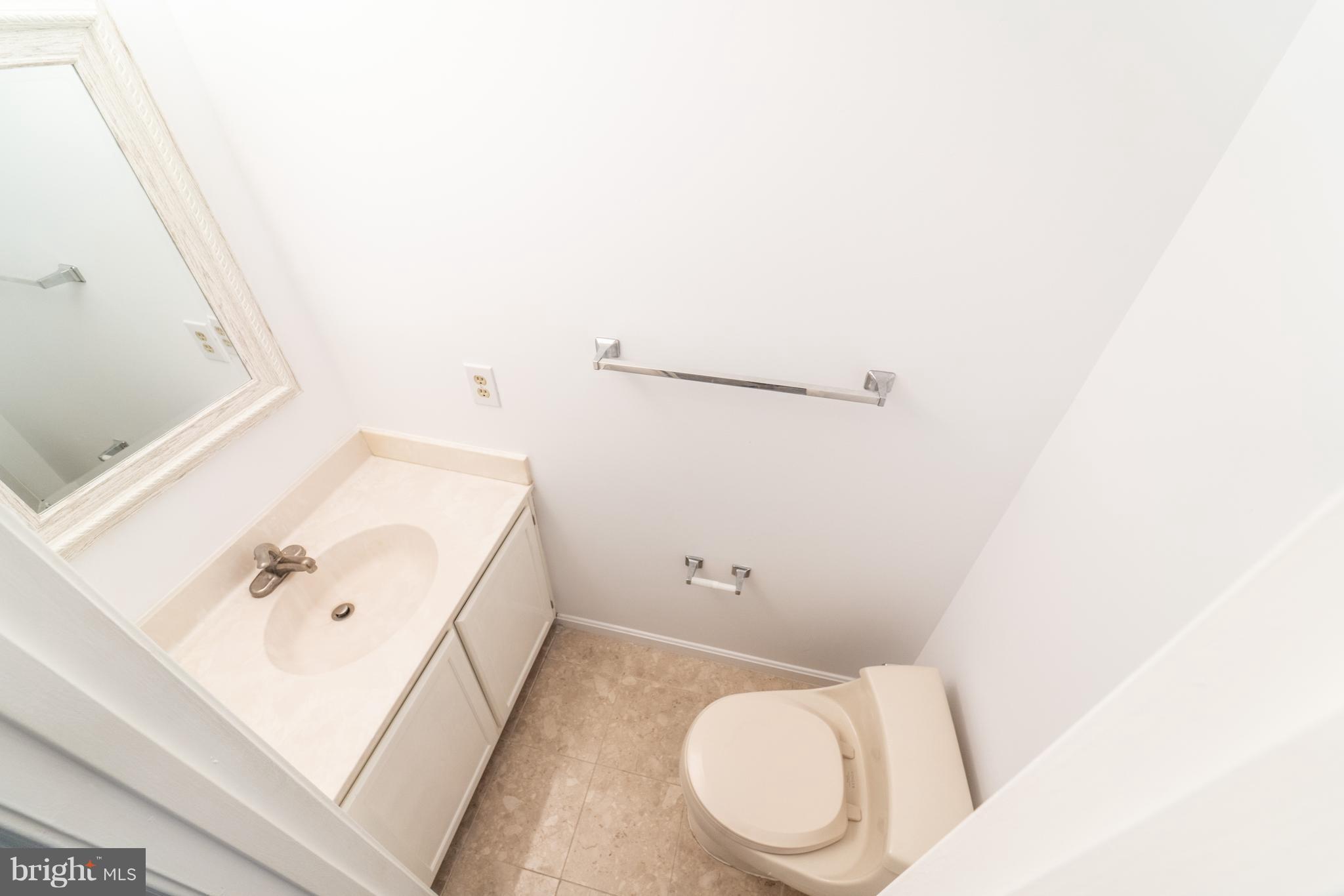 14903 Hatteras Way Silver Spring, MD 20906 - Photo 14 of 30 Renovated powder room on main level!
